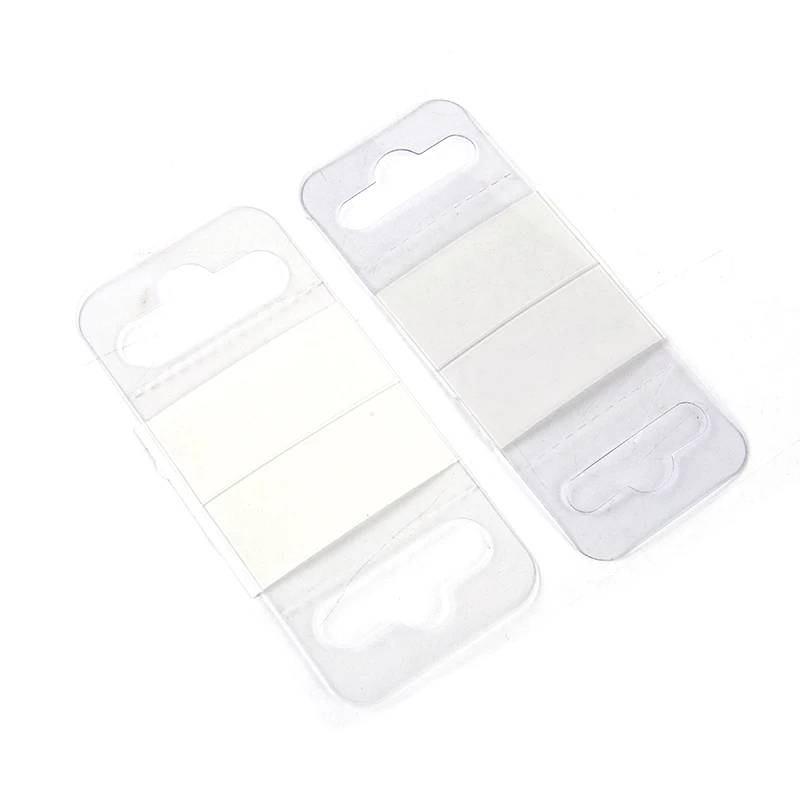 100pcs PVC Slot Hole Adhesive Hang Tabs Hook Plastic Transparent Hook Merchandise Package Box Bag Hangers Peghooks Display