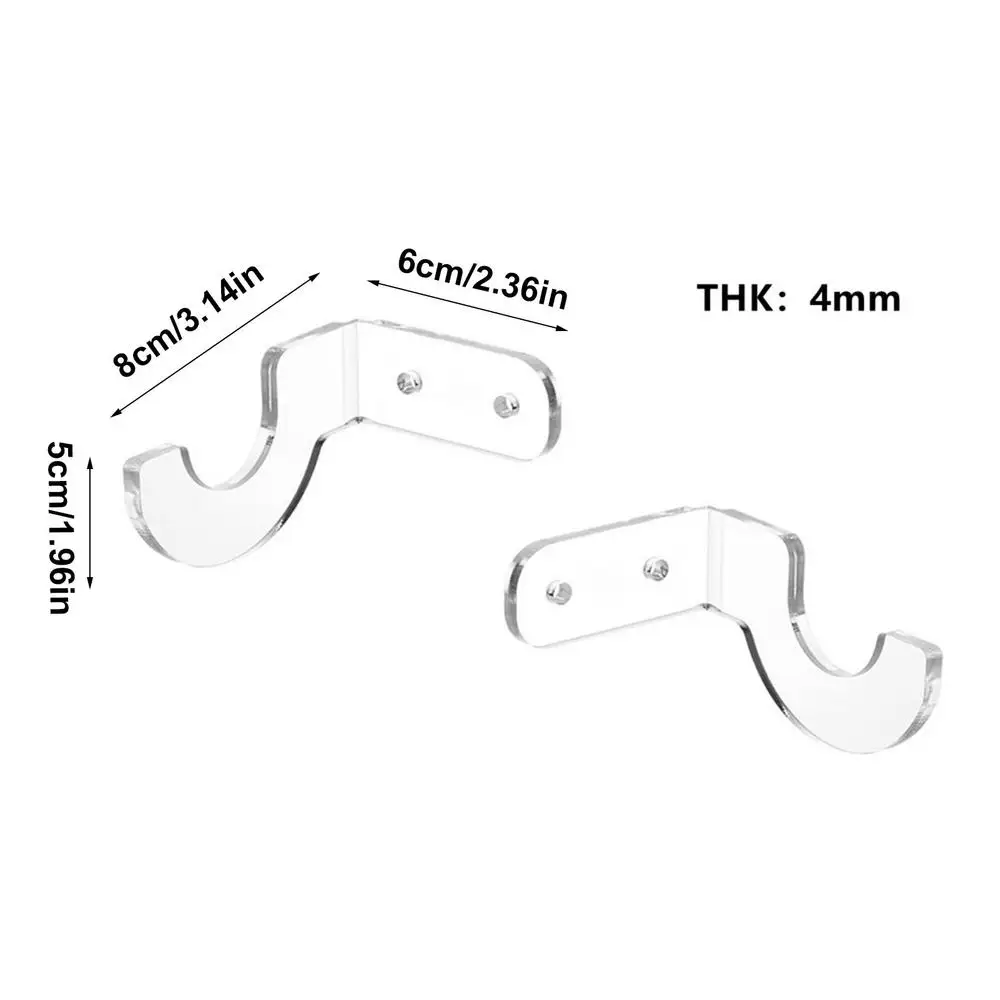a pair of clear plastic hooks