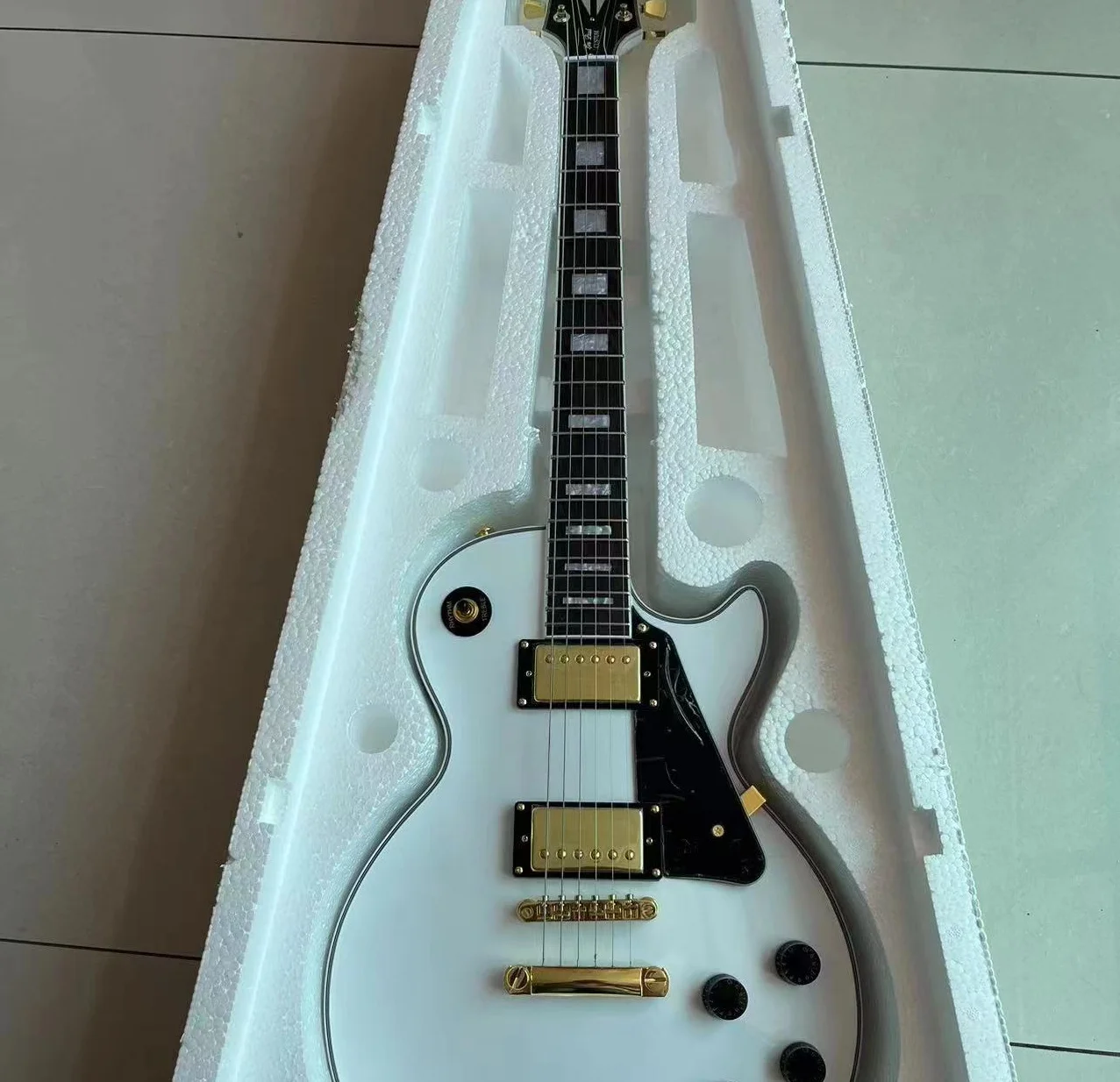 

Fast delivery, factory customized electric guitar, gold hardware, HH pickup, rosewood body, quality assurance THYTJYT
