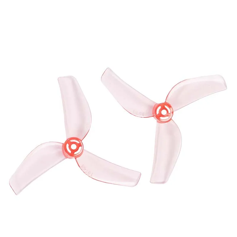 Paire d'hélices Gemfan 1614-3 PC pour drones FPV micro, rotation opposée, sur fond gris.