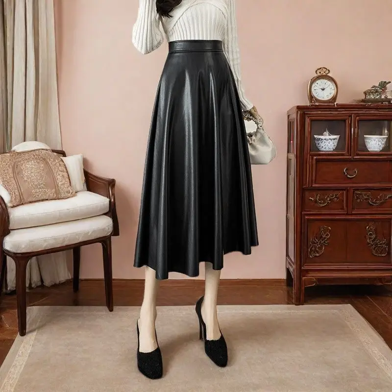 חצאית עור לנשים חצאיות מטריה סגנון כיסוי ירכיים סלימינג תחושה גבוהה שחורה חצאית מלאה עור חצי