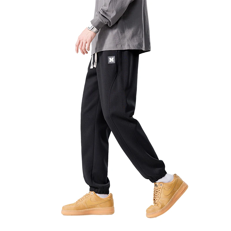 Spring Autumn New Solid Color Fashion Elastic Waist Sweatpants Man High Street Casual Loose Pockets Drawstring Cotton Trousers