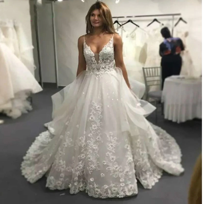 

Luxury Lace Wedding Dresses A-Line Spaghetti Straps V-Neck Backless Boho Wedding Gown Bead Lace Appliques Bridal Gowns for Bride