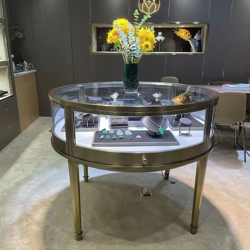 

Customized Jewelry shop glass display luxury round stainless steel jewelry display cabinet for sale
