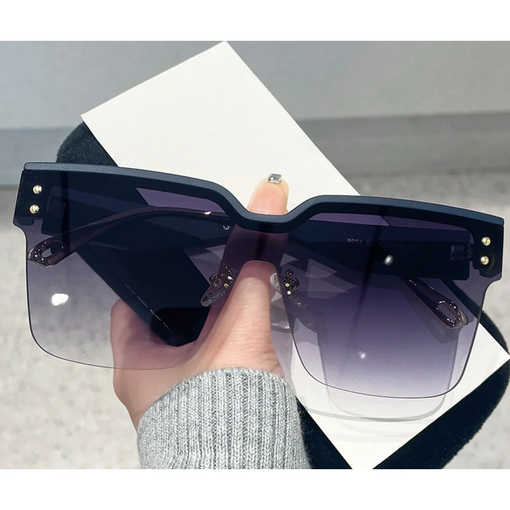 Neue heiße verkaufende einteilige Sonnenbrille mit halbem Rahmen, Modetrend, personalisierte Netzwerk-Sonnenbrille mit rotem, schlichtem Gesicht für Damen_voghion.com