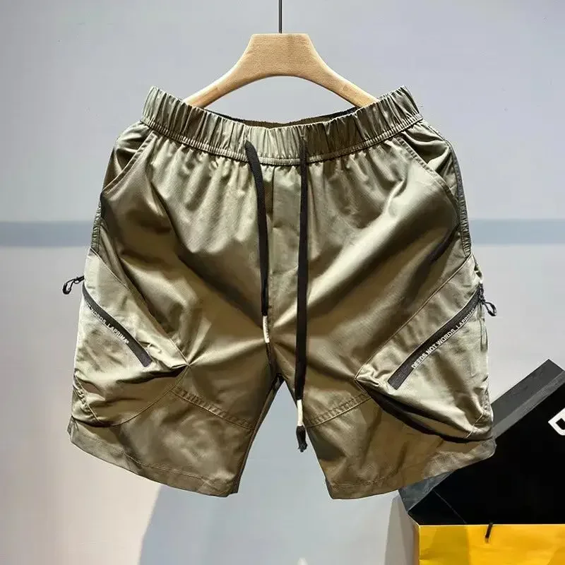 thumbnail image 1 of Pantalones cortos masculinos con cordón anchos y holgados, pantalones cortos cargo para hombre con cremallera, nuevos en ropa de calle informal Y2k, estilo coreano elástico, 1 of 4