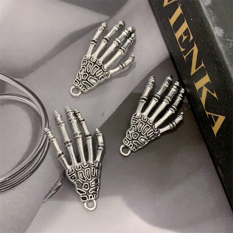 

100Pcs Ghost Skull Hand Metal Pendant Cosplay Gifts（Pendant Only）DIY Toys for Necklace Keychain