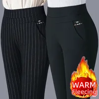 מכנסיים דקים ומחמיאים לנשים בצבע אחיד, מתאימים לעונת הסתיו והחורף של 2025, עם מותן גמיש וגזרה צמודה 1