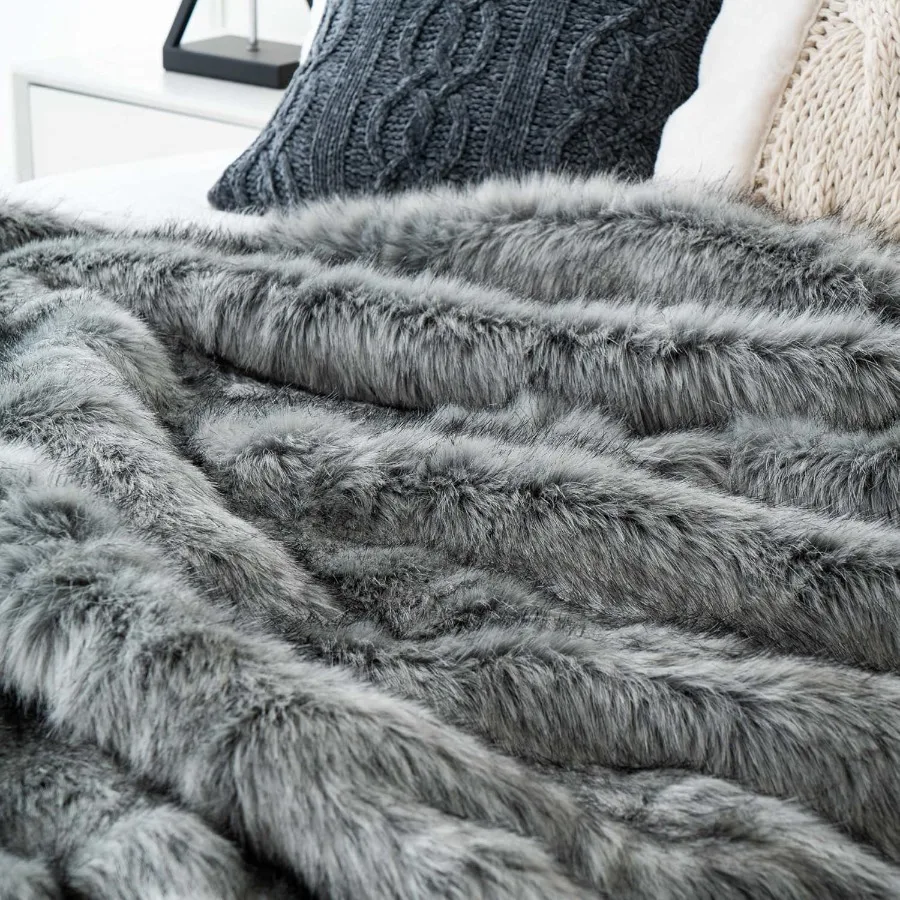 Extra large faux fur blanket perfect for couch or bed super soft and fluffy with elegant grey color featuring black tips revers