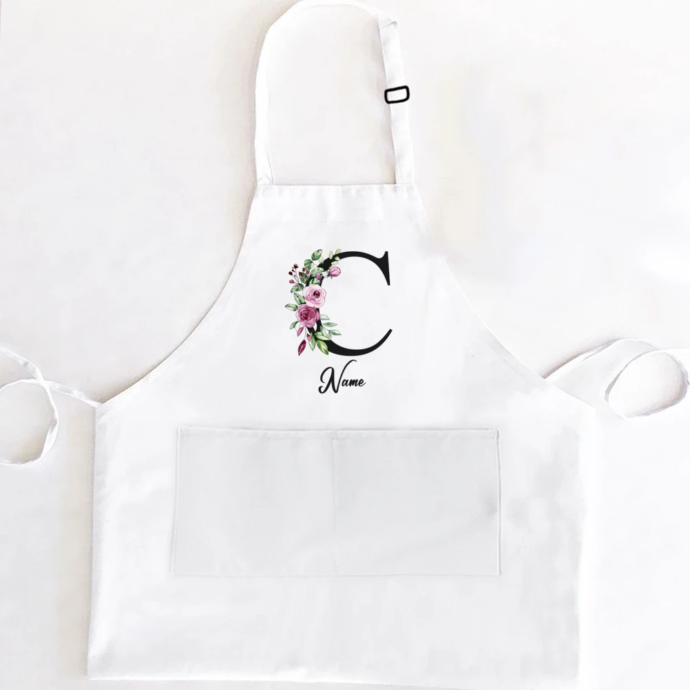 https://ae01.alicdn.com/kf/S9c88c9a7b27a422aba802b5d59a9325bl/Personalized-Kitchen-Aprons-Floral-Initial-W-Name-Customized-Women-Cooking-Apron-W-Pockets-Custom-Chef-White.jpg