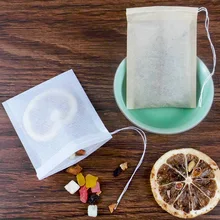 Sachets de thé jetables en tissu Non tissé de qualité alimentaire, 100 pièces, filtre à épices, infuseur à thé avec ficelle, scellé