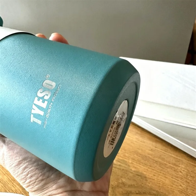 TYESO Stainless Steel Insulated Sports Thermos Cup with Handle - Portable and Durable Thermal Mug for Outdoor Travel (500/710ml)