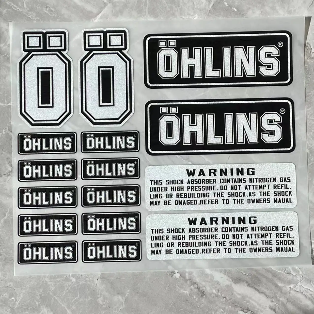 OHLINS   ݻ  ƼĿ,   ʸ  Ʈ 