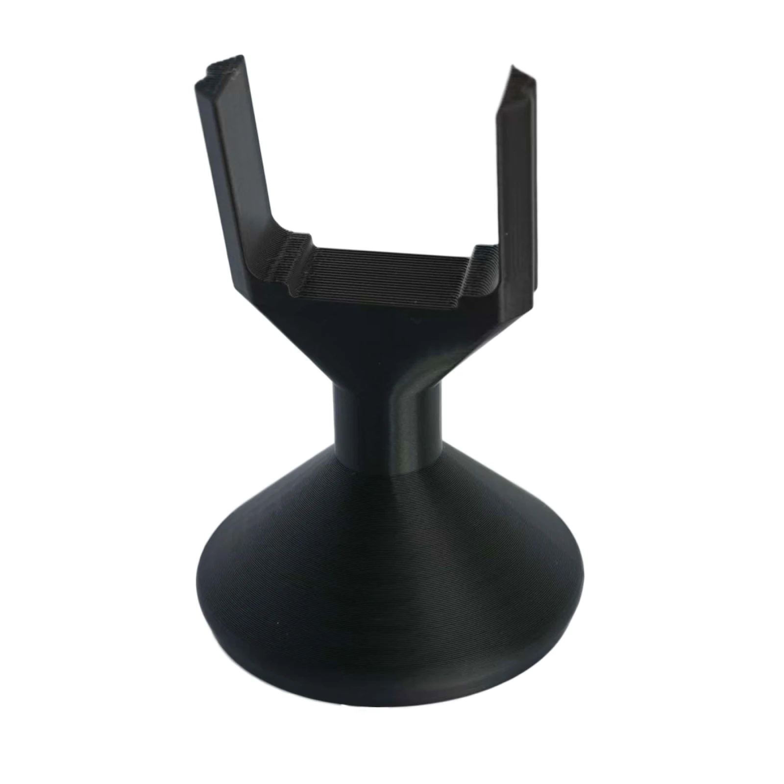 Présentoir design pour drone DJI Neo 2 sur un bureau moderne, mettant en valeur l'appareil comme objet de décoration.