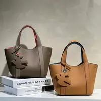 حقيبة جلدية ب لونين مختلفين من الداخل و الخارج 2