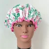 Alpha pink and white shower cap features organization name and feminine Greek letters. 1