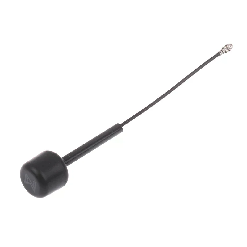 Antenne omnidirectionnelle 5.8GHz LHCP installée sur un drone FPV, avec câble coaxial et gaine thermorétractable.