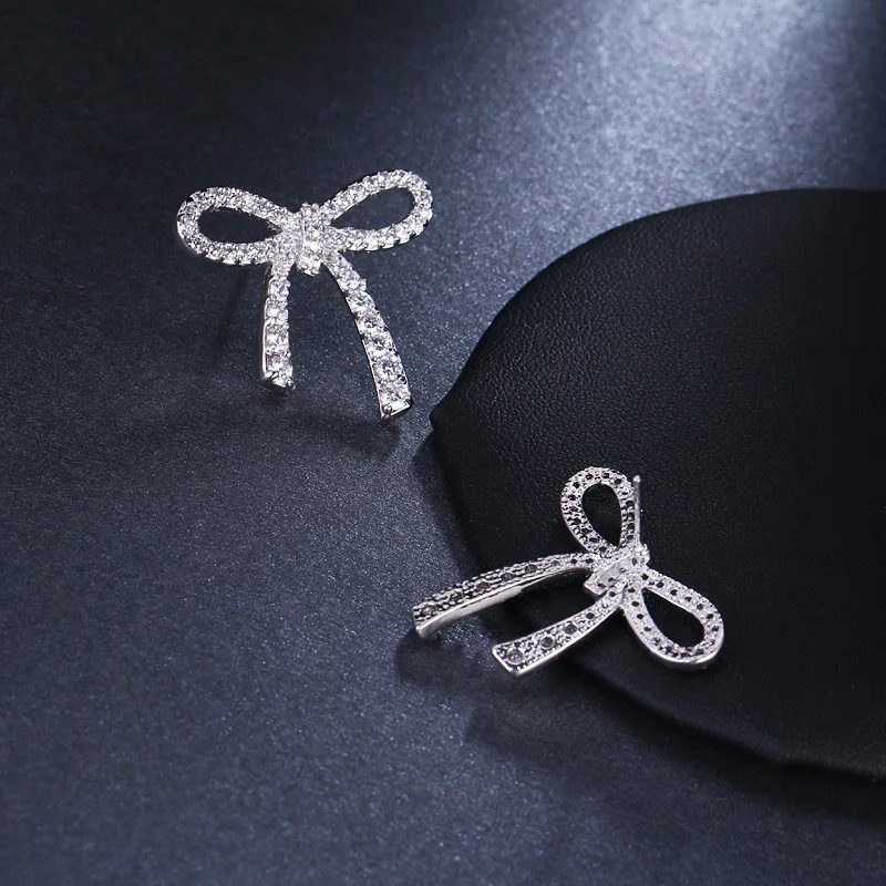 Zircon earrings with bows