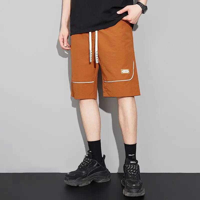 Men's casual handsome shorts, summer breathable five-point pants, ice silk loose pants, sports