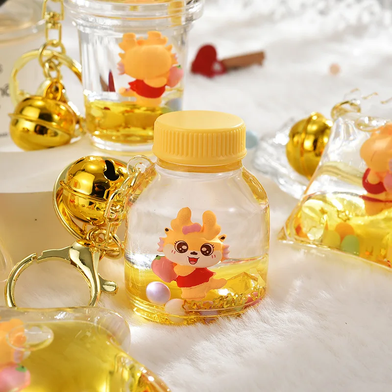 Cartoon Star Bubble Tea Drink Bottle Portachiavi Liquid Floating Lucky Dragon Portachiavi Coppia Charm Bag Ciondolo Portachiavi Regali