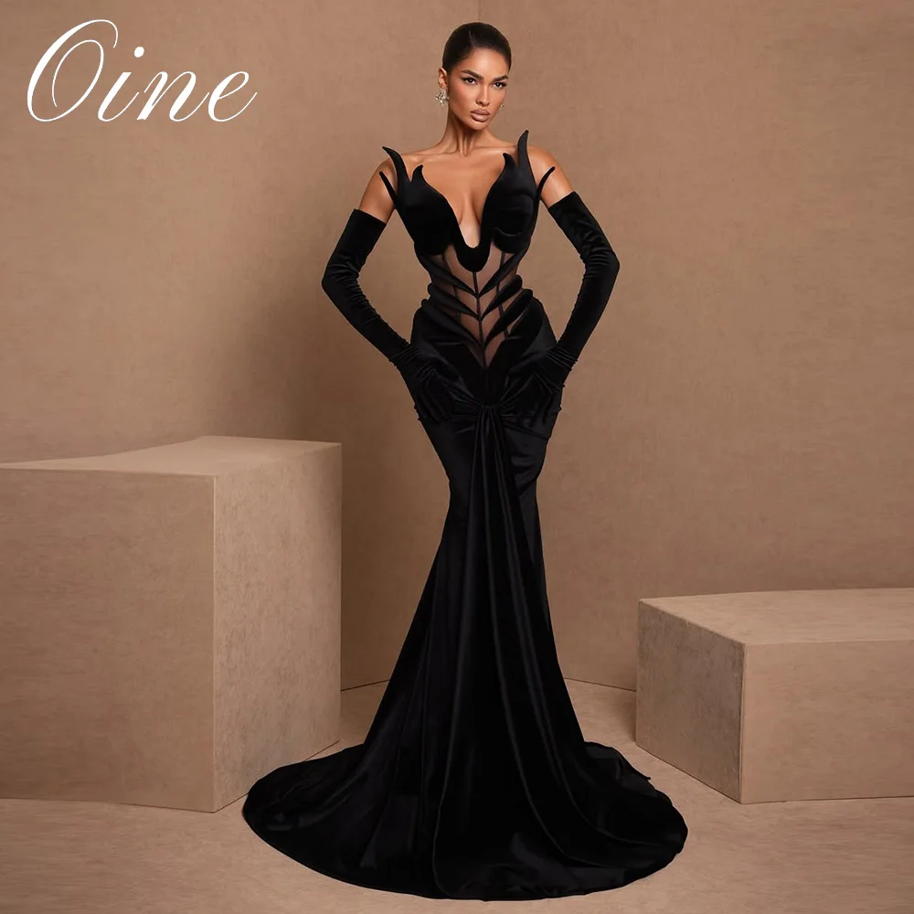 Model wearing Oine Elegance Black Velvet Mermaid Evening Dress 1