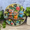 Wooden wall clock with cute owl patterns, perfect for home decor. Requires AA batteries 5