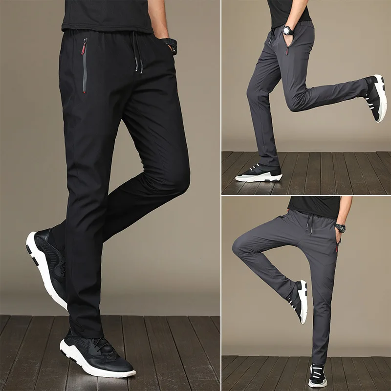 2024 pantaloni sportivi ad asciugatura rapida pantaloni da corsa da uomo con tasche con cerniera pantaloni sportivi da allenamento pantaloni sportivi Casual Fitness