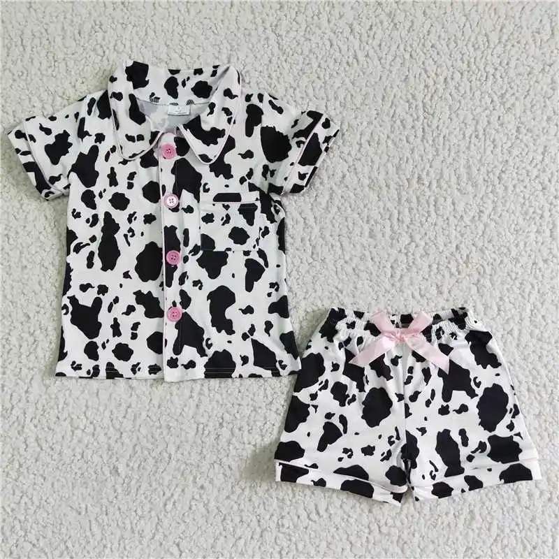 

Wholesale Baby Girl Western Rodeo Summer Nightclothes Children Short Sleeves Cow Print Tops Pajamas Sleepwear Shorts Sets Outfit