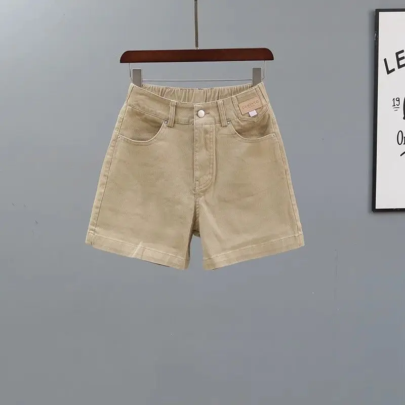 Women's 2024 Summer New Spliced Button Zipper Pocket Fashion Solid Color High-waisted Loose Minimalist Straight Denim Shorts