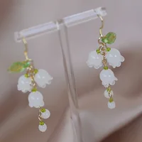 2025 New Sweet Temperament Small Fresh Bamboo White Lily Of The Valley Flower Earrings Elegant And Gentle Asymmetric  Earrings 1