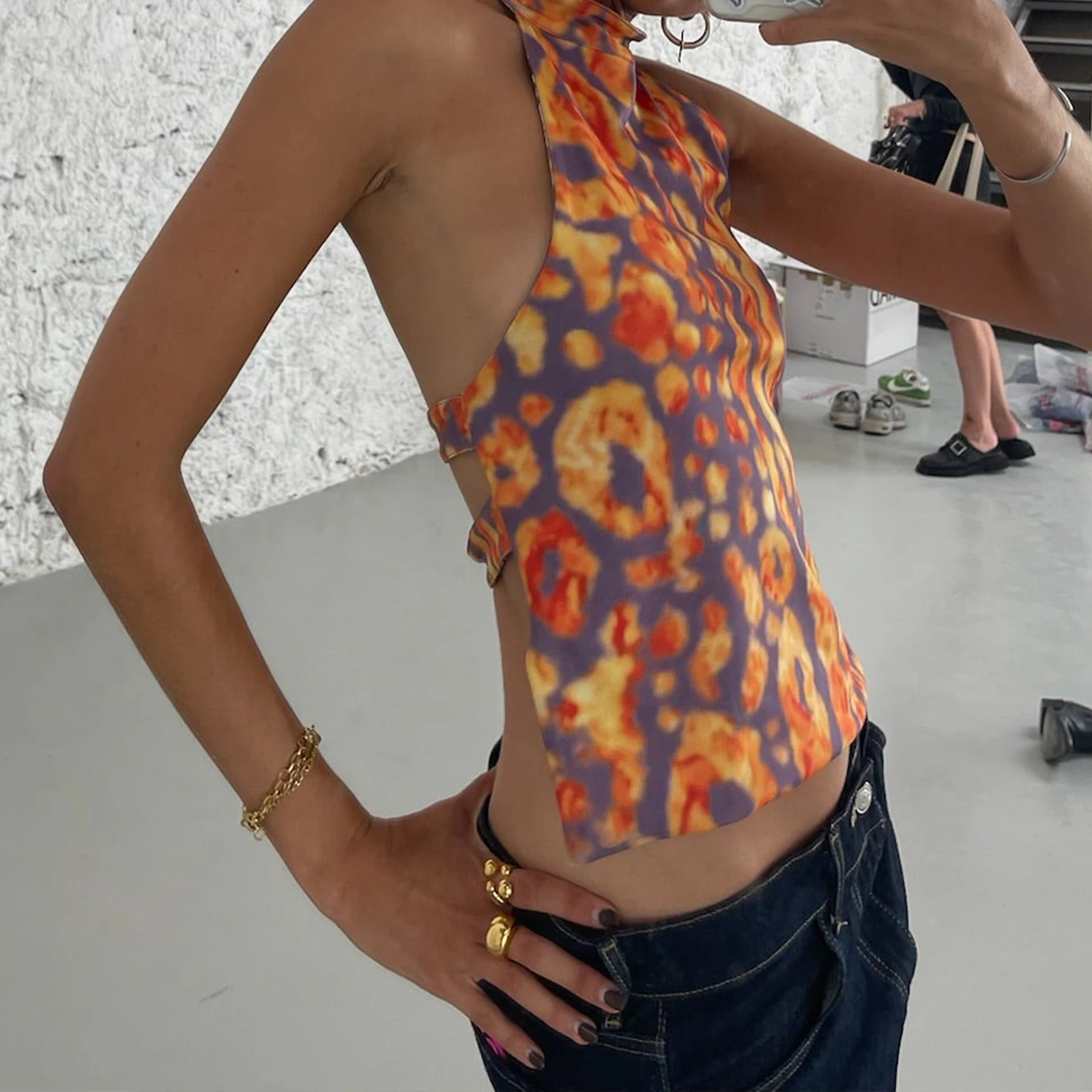 รูปสินค้า เสื้อแฟชั่น Y2K ลายดอกไม้ แขนกุด เปิดหลัง สำหรับสาวเท่