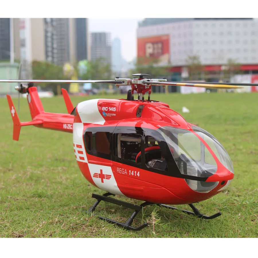 Hélicoptère RC RTF Mode 2 prêt à voler, vue de dessus du rotor principal et de la queue, avec le logo de la marque.