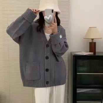 Nuovo cardigan lavorato a maglia semplice di fascia alta allentato da donna autunno e inverno Etichetta con maniche arrotolate Giacca maglione pigro glutinoso morbido 1