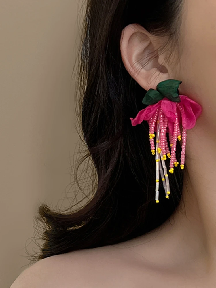 تراجي مشغولة يدويا أزهار 2