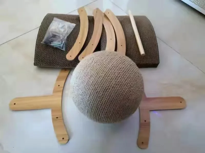 Cat scratching ball featuring a sturdy triangular base for safety