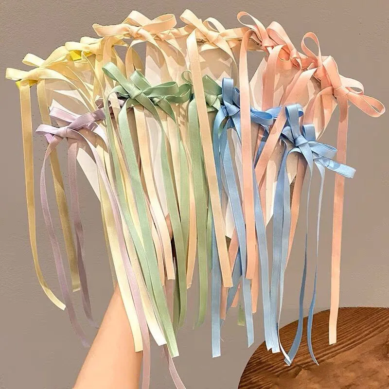 Рисунок 2 - Заколки для волос с длинными лентами и кисточками