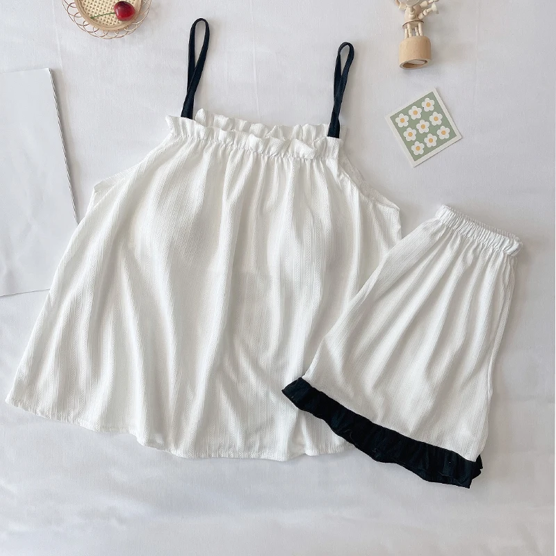Summer new thin casual sweet solid color sexy suspender with chest pad 2 sets of young girls' home clothes free delivery