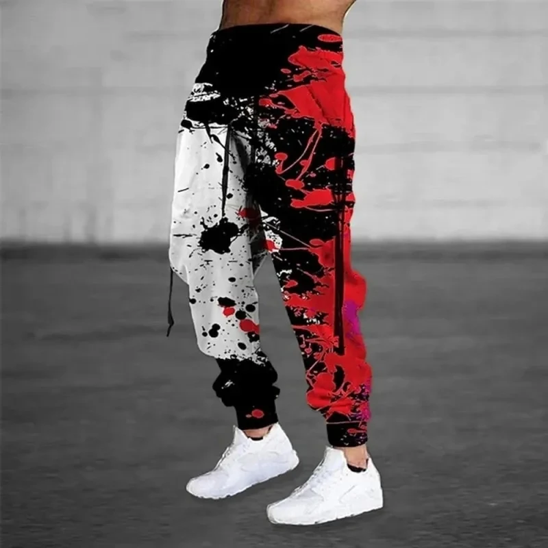 Calças de jogging casuais masculinas com estampas de respingos de tinta a óleo, adequadas para calças de moletom com cordão da moda outono e inverno ao ar livre