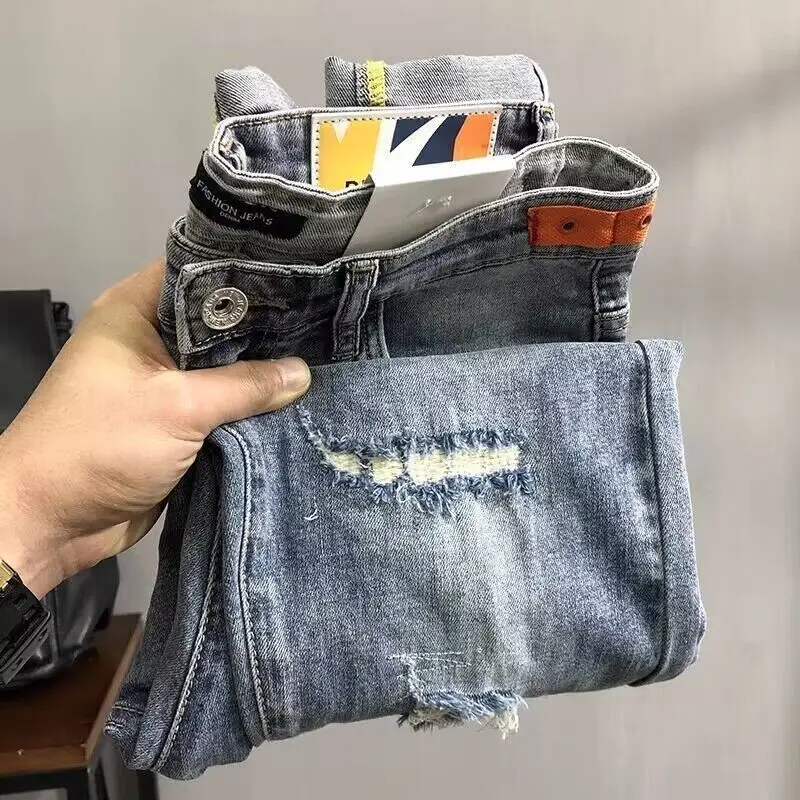 Fashion men's casual jeans vintage spring and autumn slim ripped jean pants with HOLE design men clothing luxury cargo pants