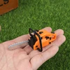 1PC Simulation Repair Tool Saw 1:12 Dolls Houses Miniature Chain Saw Lawn Mower Garden Decor Furniture Accessories Pretend Toys 1