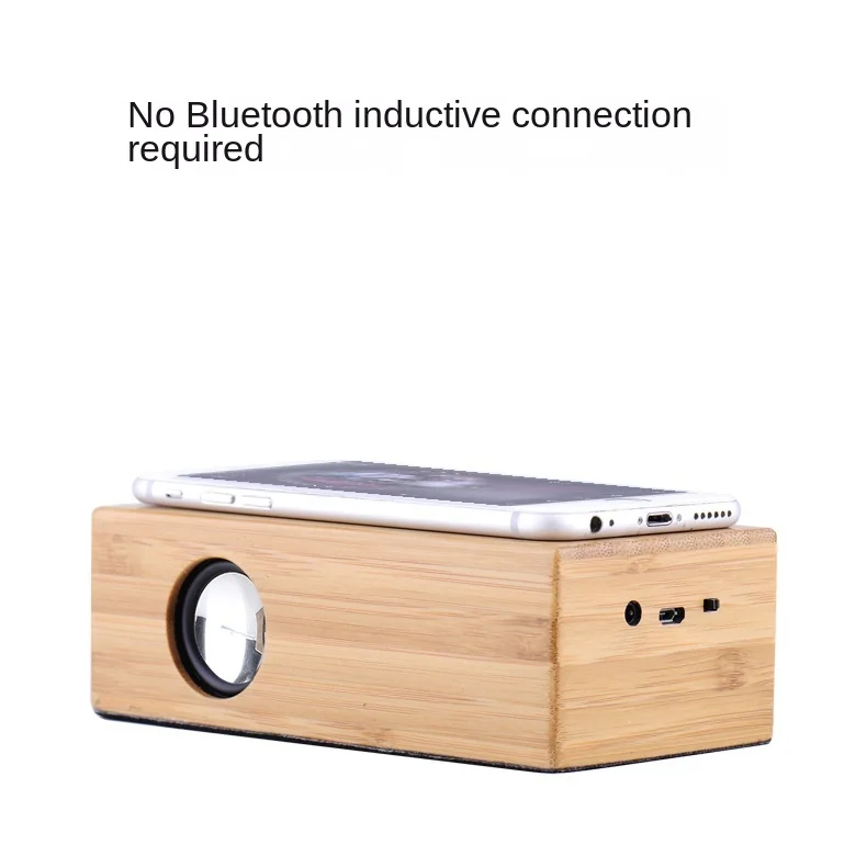 

Black technology induction mobile phone small speaker wireless subwoofer loud wood home desktop computer sound