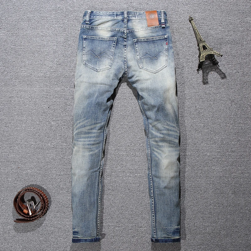 Italian style fashionable men's jeans retro light blue elastic slim fit slit jeans men's buttoned up pants retro designer jeans