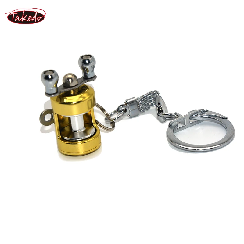 TAKEDO ST2 HOT SEAL Metal MINI Fishing Reel Keychain Car Keychain For Car Accessories Fishing Reel Shape