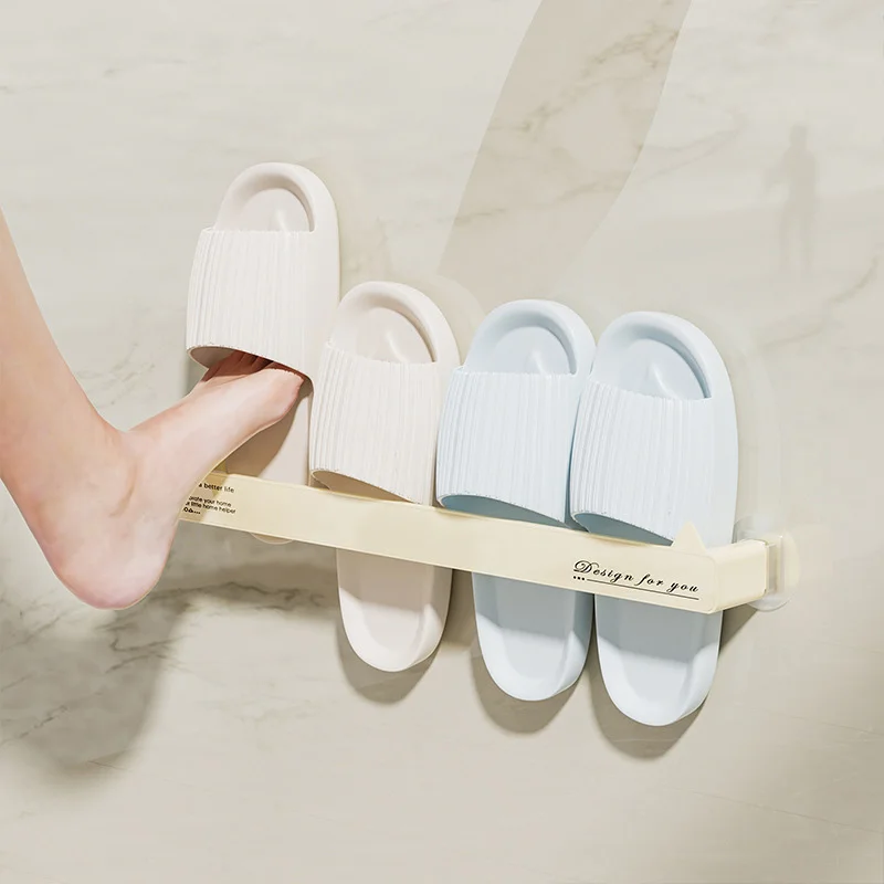 https://ae01.alicdn.com/kf/S9e829e8780a645fabde3a5fd69ecca8f0/Wall-Mounted-Shoes-Rack-Hole-Free-Bathroom-Slippers-Rack-Drain-Towel-Shoe-Racks-Space-Saving-Shoe.jpg