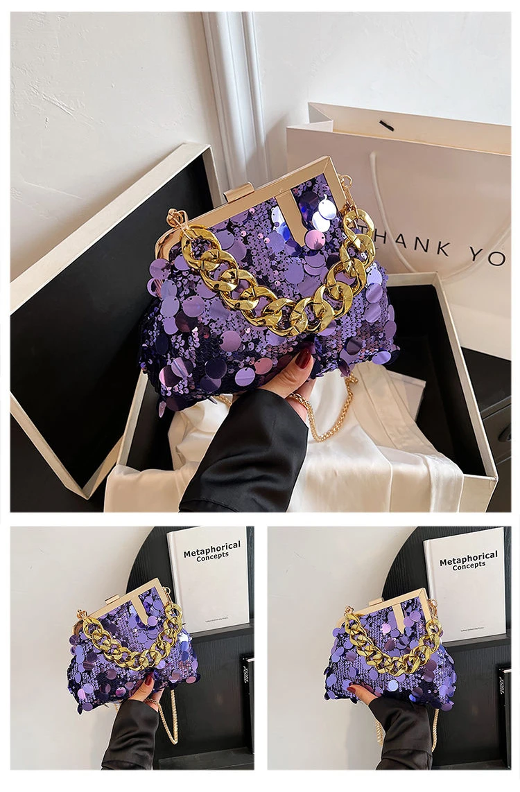 Carauana UNIU Mirage Clutch worn on shoulder with chain strap