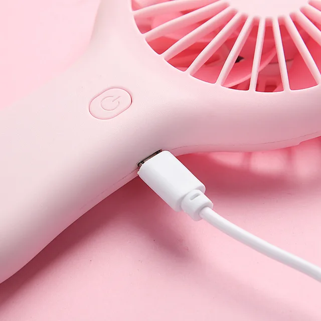 시원함과 편안함을 손 안에 담은 휴대용 미니 팬