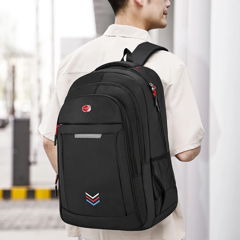 Large-capacity backpack - a durable and stylish laptop bag, equipped with a secure zipper closure and mesh side pockets