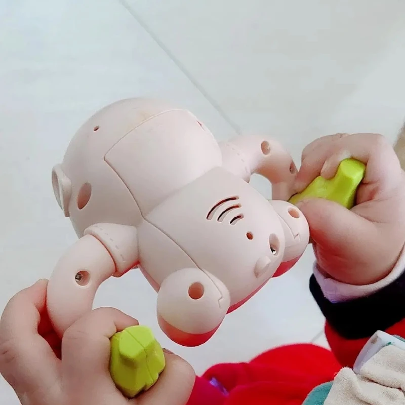 어린이용 전기 뒤집기 돼지 조명 및 음악은 감각을 자극하며, 조기 교육 및 부모-자녀 상호작용에 이상적입니다.