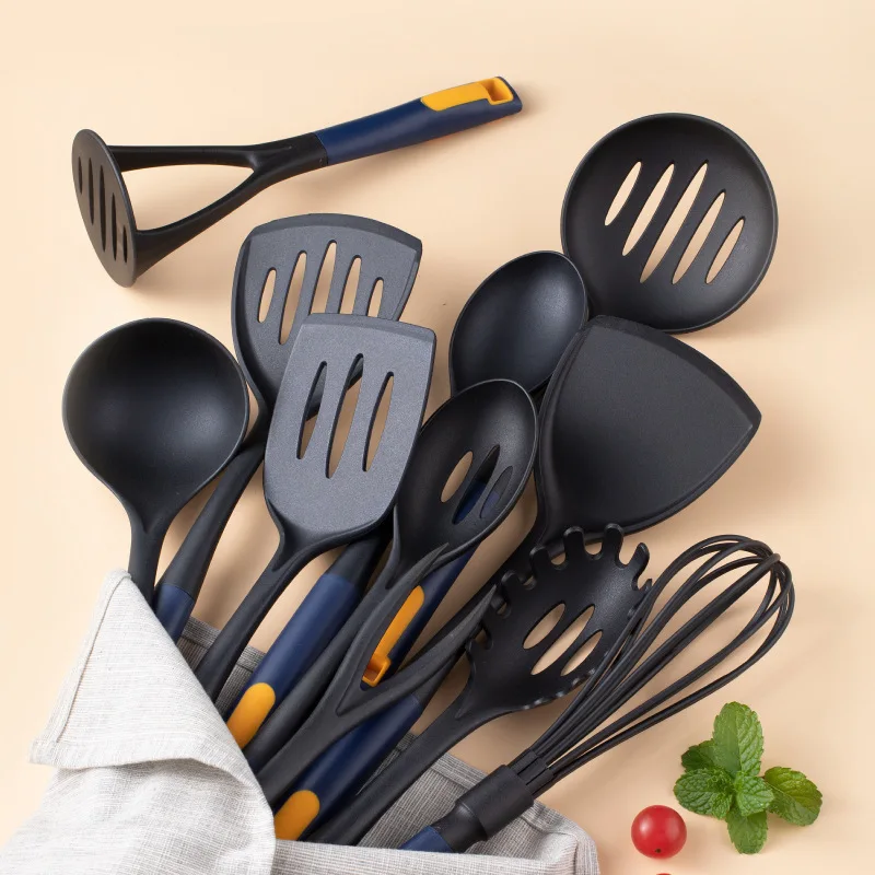 https://ae01.alicdn.com/kf/S9f0a261709e94406af74959d71fb54b2H/11pcs-Black-Silicone-Cooking-Utensils-Set-Non-Stick-Pan-Baking-Tools-Kitchenware-Slotted-Turner-Spatula-Spoon.jpg