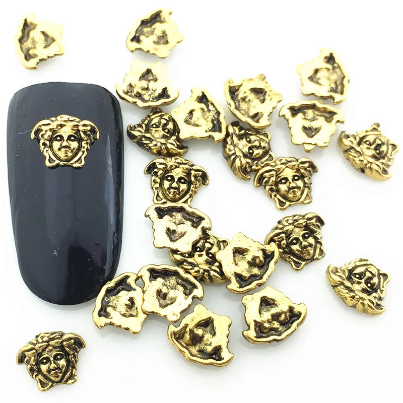 

100pcs Metallic Old Man's Head Restored To The Ancient Sphinx Figure Japanese Nail Charms Pasted With Alloy Ornaments Gold